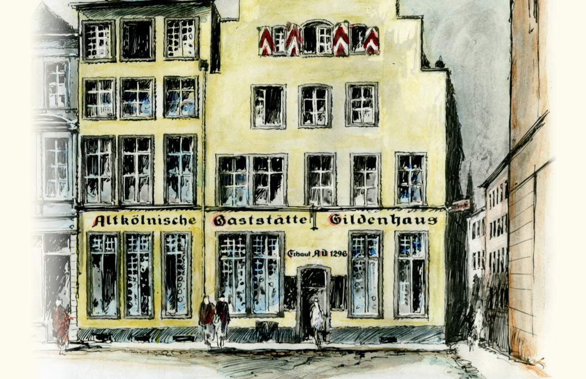 Ein historisches gelbes Gebäude mit dem Namen Gaststätte ist im Bild zu erkennen, Menschen gehen davor vorbei.